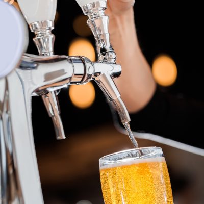 Pouring a Draft Blonde Beer from the Tap